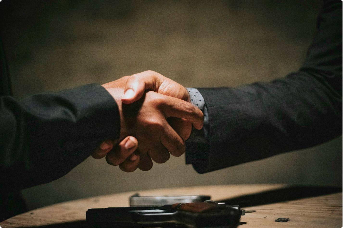 Business partners shaking hands