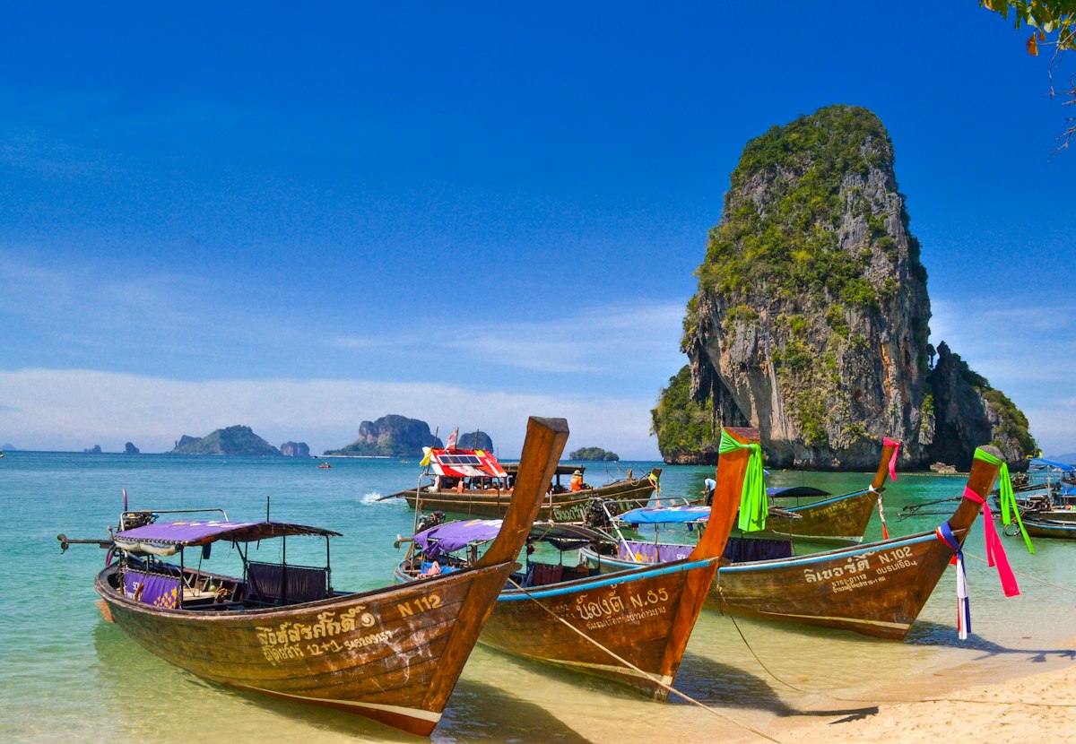 Longtail boats on the water in Thailand
